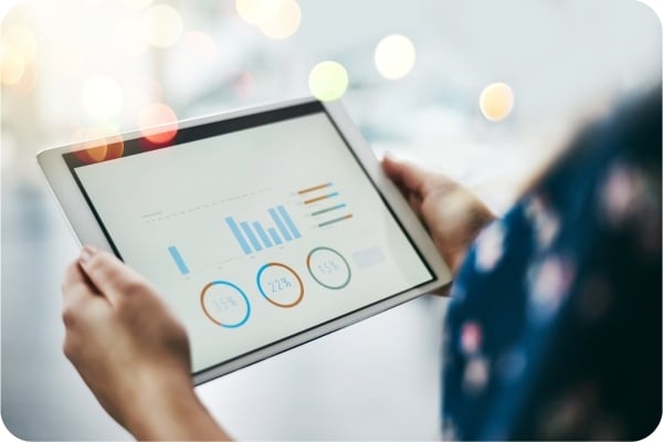 Person viewing a dashboard on a tablet